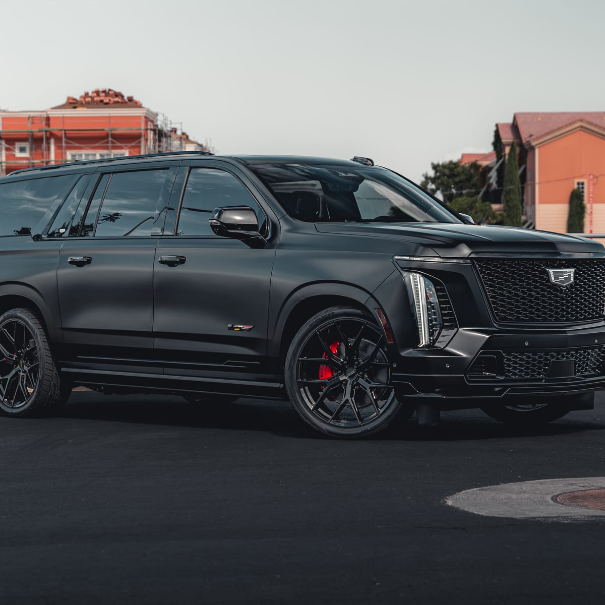 Matte black Cadillac Escalade V with all-around ceramic window tint