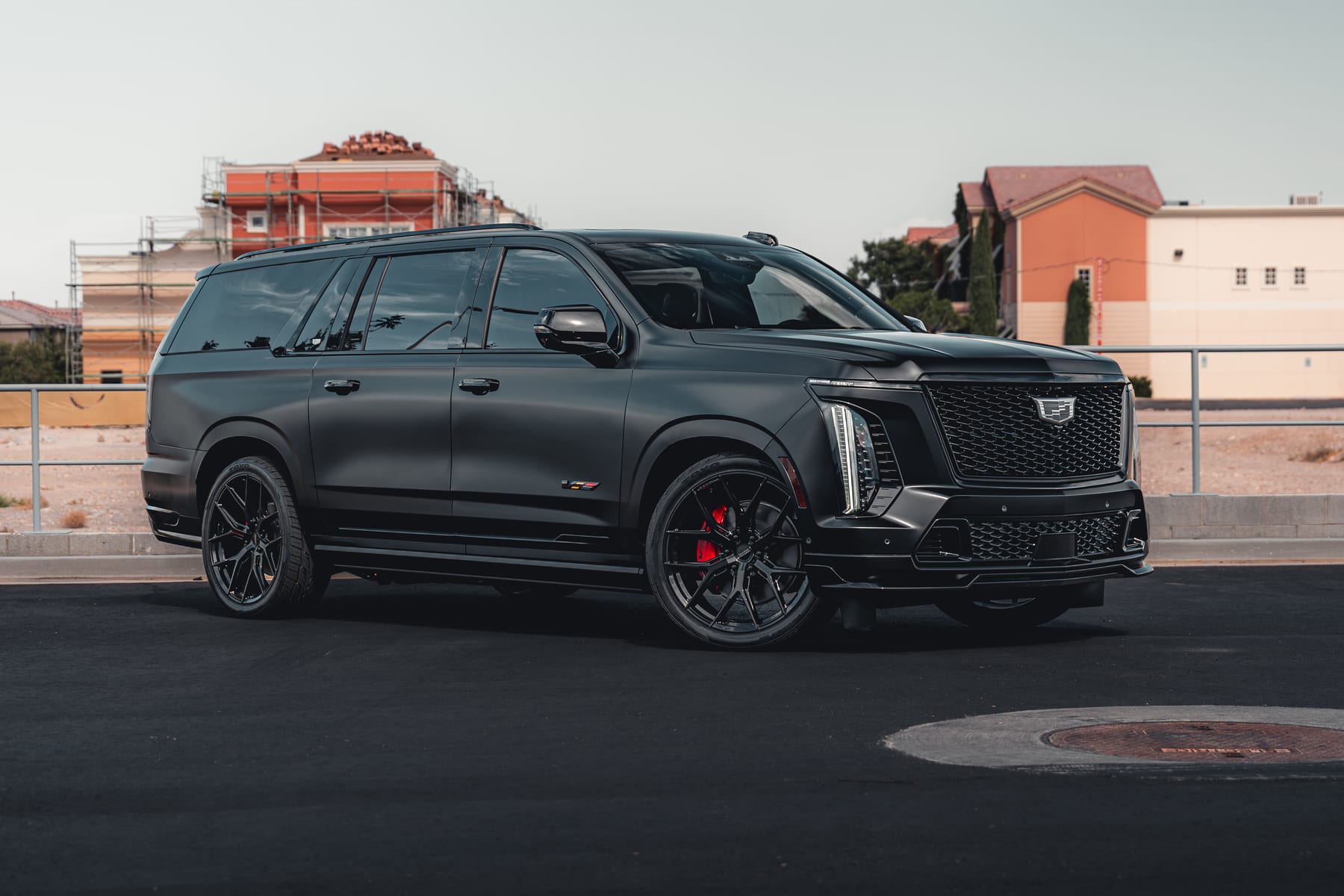 Matte black Cadillac Escalade V with all-around ceramic window tint